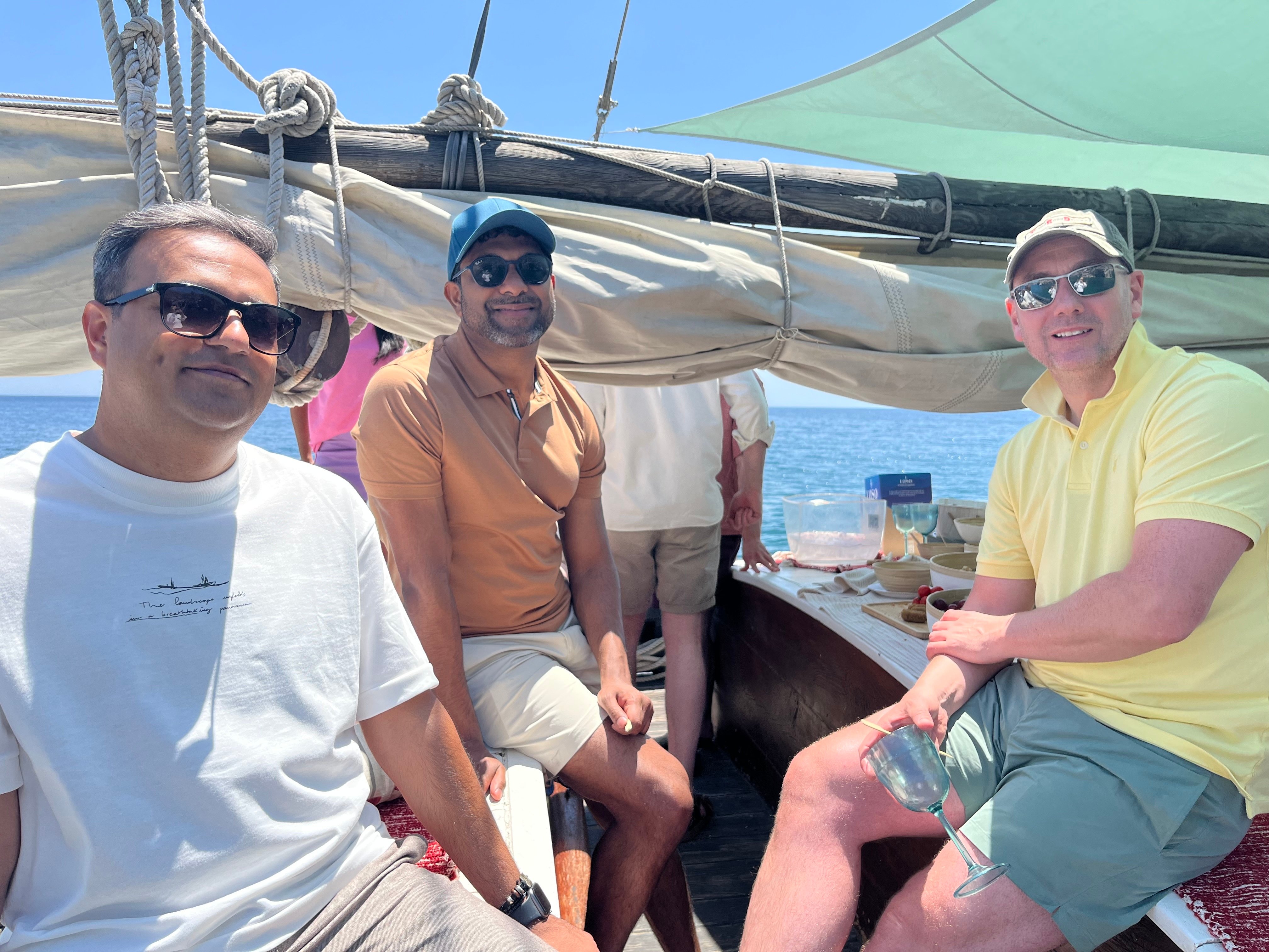 Matt B Gaurav Harsha on boat